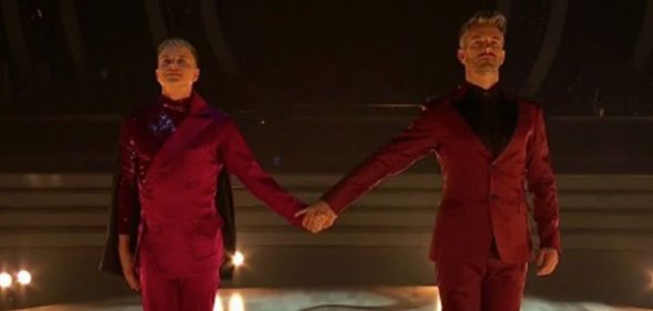 Courtney Act/Shane Jenek and Joshua Keefe holding hands