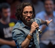 Jean Wyllys, Rio de Janeiro federal deputy for the Socialism and Liberty Party (PSOL) speaks during a rally of Brazilian leftist parties at Circo Voador in Rio de Janeiro, Brazil, on April 02, 2018