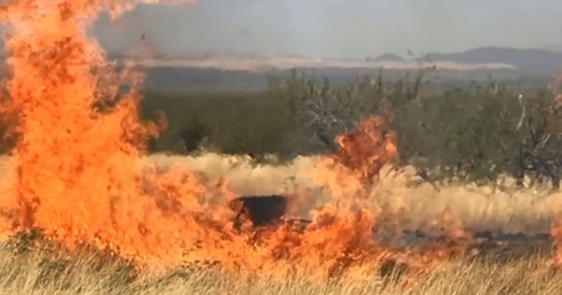 A screenshot from a video of the gender reveal party in Arizona which caused a huge wildfire