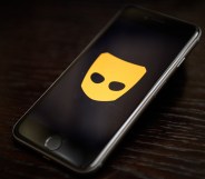 Grindr logo on an iPhone screen