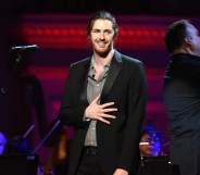 Musician Hozier performs onstage during the ONE Campaign and (RED)'s concert to mark World AIDS Day, celebrate the incredible progress that?s been made in the fights against extreme poverty and HIV/AIDS, and to honour the extraordinary leaders, dedicated activists, and passionate partners who have made that progress possible. At Carnegie Hall on December 1, 2015 in New York City.