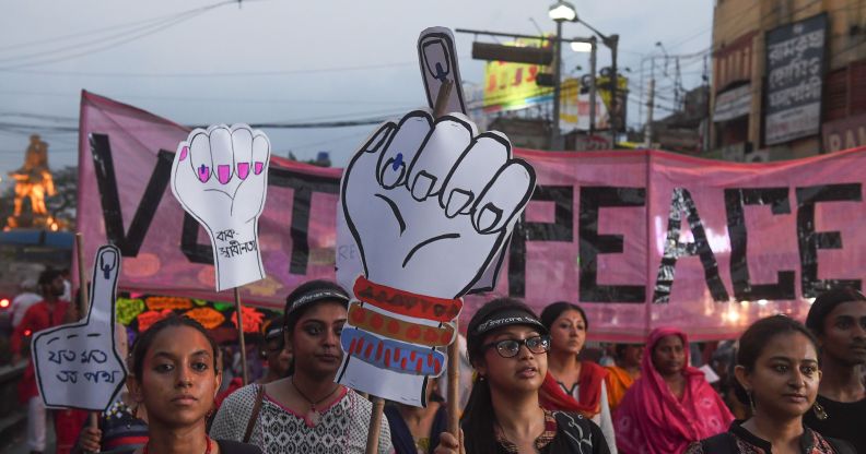 Women holding placards during a rally