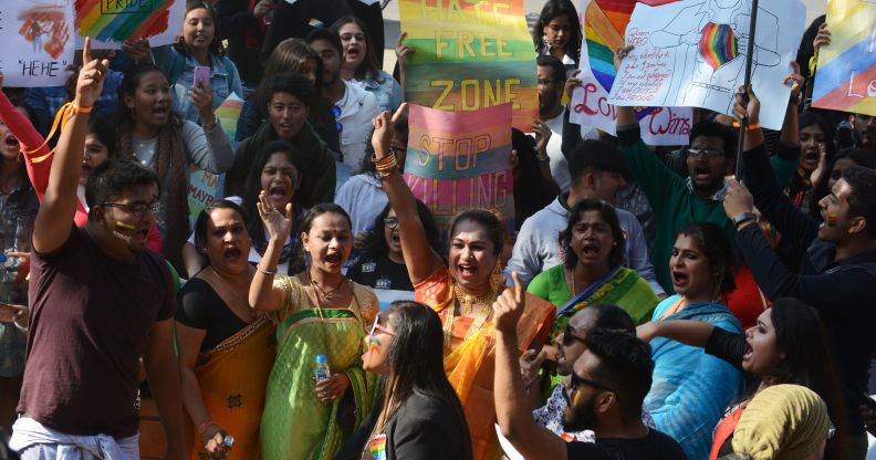 Indian activists and members of the lesbian, gay, bisexual, and transgender (LGBT) community take part in a pride parade in Siliguri on December 30 2018