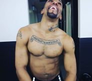 Kawaski Trawick, topless and smiling