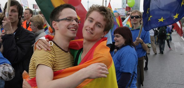 People pose as they took part in the ''Baltic Pride 2010'' march, the first gay pride event in Lithuania, on May 8, 2010