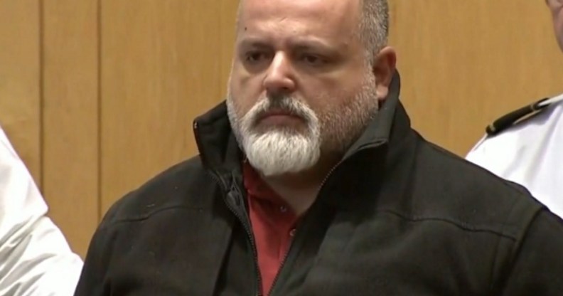Carlos Vieira, a police officer in Lawrence, Massachusetts, sits in court