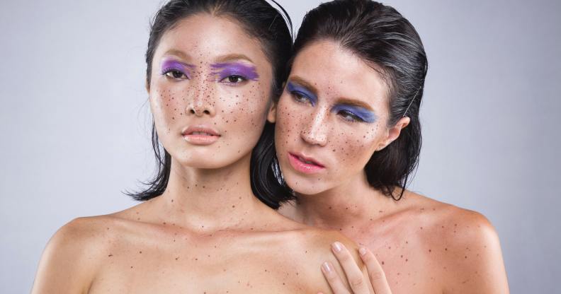 A woman embraces another woman