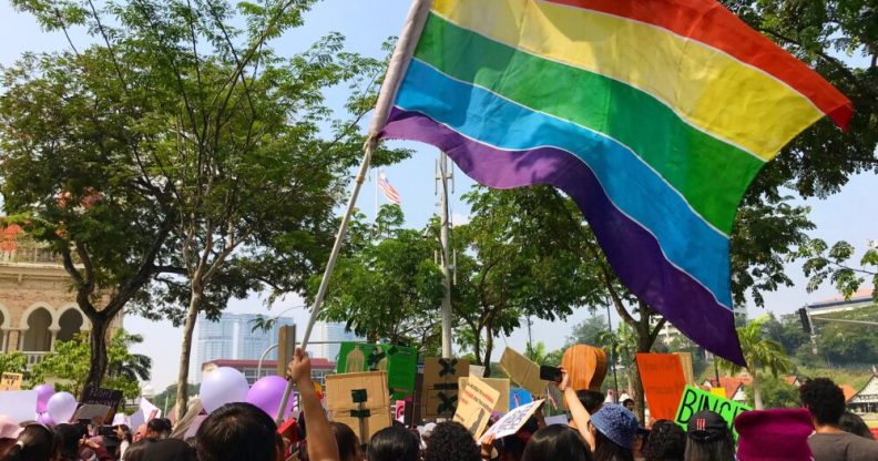 Malaysia A LGBT pride flag flies at the women's march in Malaysia on March 9.