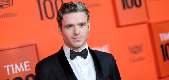 Richard Madden in a suit