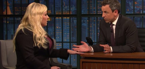 Seth Meyers interviews Meghan McCain on his show, an exchange that prompted her husband to attack him in a series of tweets.