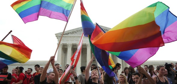 Same-sex marriage supporters rejoice after the U.S Supreme Court hands down a ruling regarding same-sex marriage June 26, 2015 outside the Supreme Court in Washington, DC.