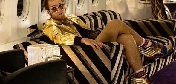 Taron Egerton acting as Sir Elton John in biopic Rocketman.