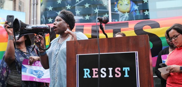 Trans army vet Tanya Walker speaks to protesters in Times Square