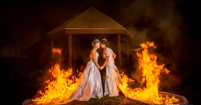 Lesbian couple sets wedding dresses on fire (Michael Huang of Cukini Studio)
