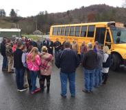 Pastor Timothy Rupard leads a group prayer following the staging of The Complete Works of William Shakespeare (Abridged)."