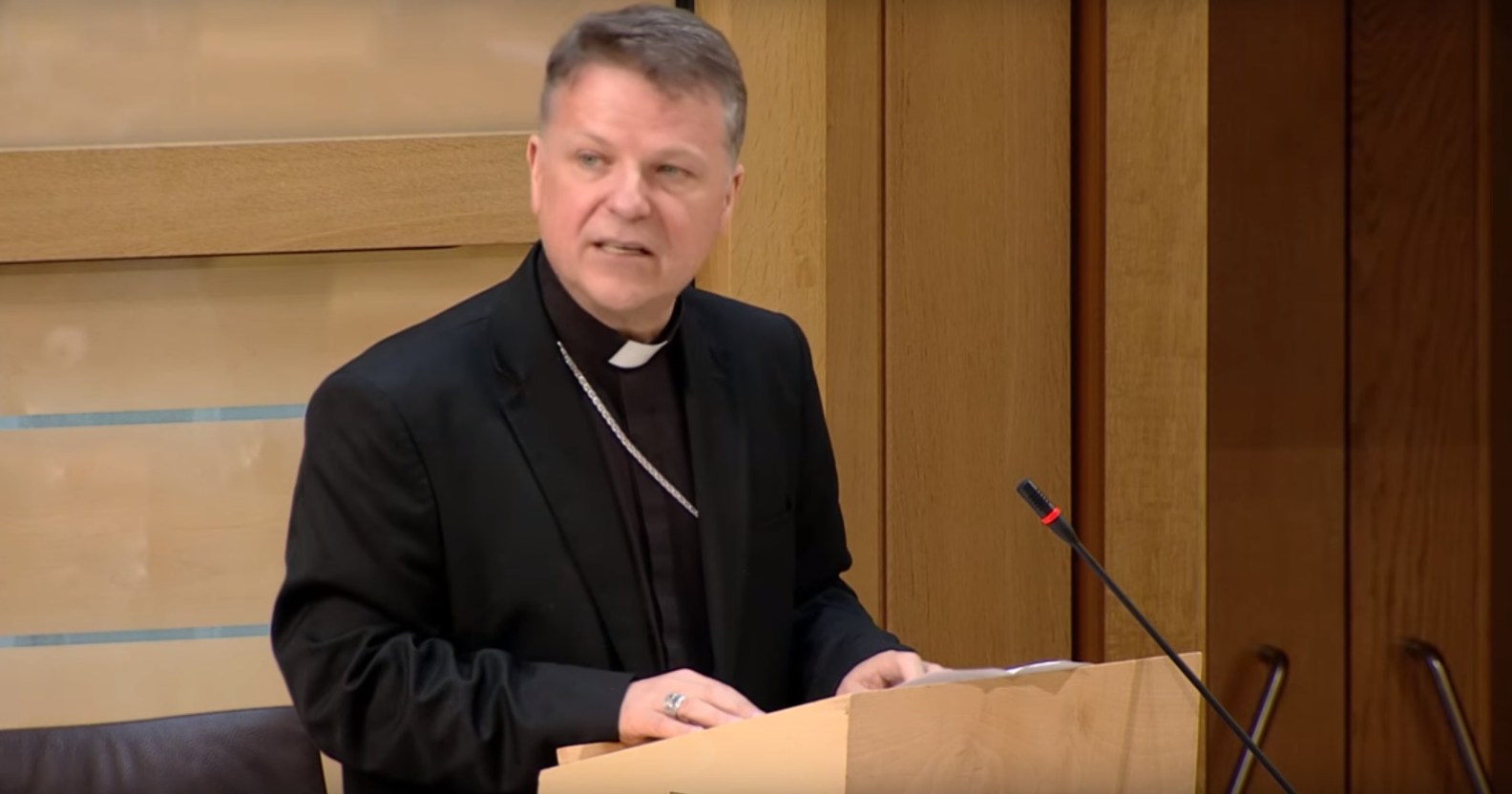 Bishop John Keenan, head of the Diocese of Paisley in Scotland, addresses the Scottish Parliament