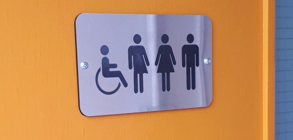 DCU gender-neutral bathroom sign
