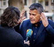 Emile Ratelband, 69, answers journalists' questions on December 3