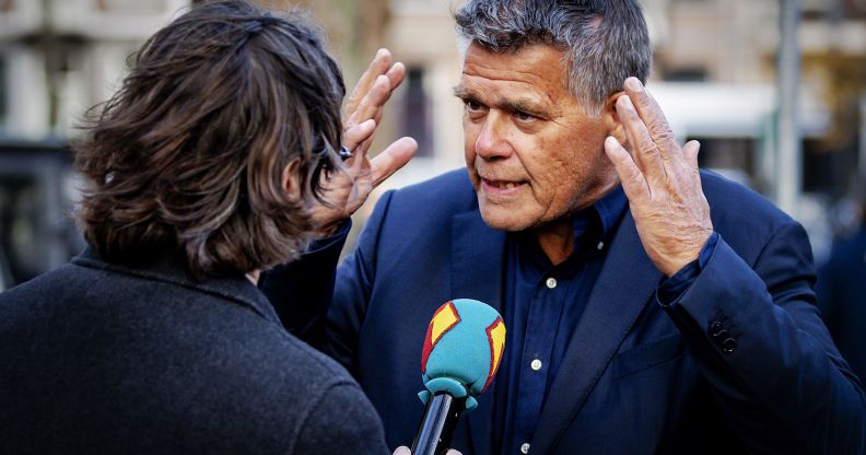 Emile Ratelband, 69, answers journalists' questions on December 3