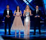 (L to R) Israel's television host Assi Azar, television presenter Lucy Ayoub, supermodel Bar Refaeli and television host Erez Tal. (JACK GUEZ/AFP/Getty Images)