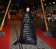 Ezra Miller wears padded gown to Fantastic Beasts premiere