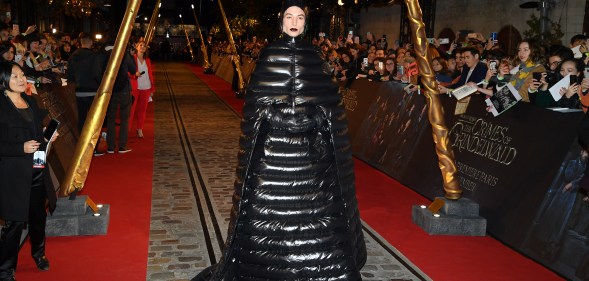Ezra Miller wears padded gown to Fantastic Beasts premiere
