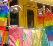 A Gay-Straight Alliance school bus takes part in a Pride parade