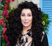 Cher poses on the red carpet upon arrival for the world premiere of the film "Mamma Mia! Here We Go Again" in London on July 16, 2018. (ANTHONY HARVEY/AFP/Getty)
