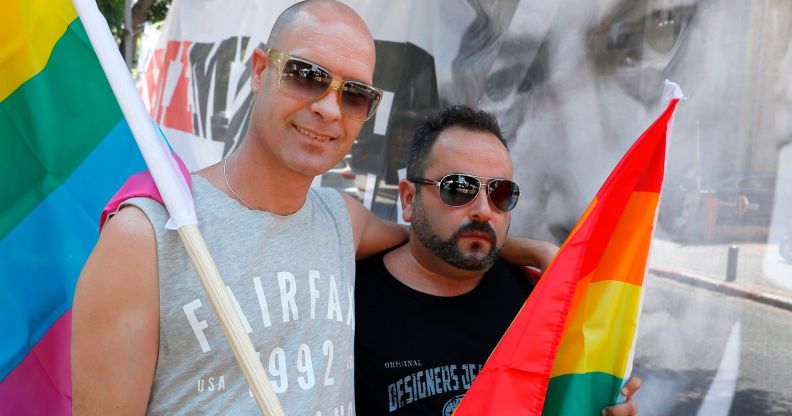Israeli protesters attend a rally in Tel Aviv on July 22, 2018, to protest against a law on surrogacy parenthood that excludes gay parents.