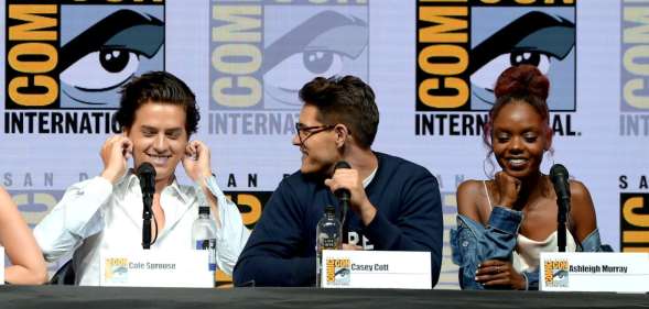 SAN DIEGO, CA - JULY 22: (L-R) Cole Sprouse, Casey Cott and Ashleigh Murray speak onstage at the "Riverdale" special video presentation and Q&A during Comic-Con International 2018 at San Diego Convention Center on July 22, 2018 in San Diego, California. (Photo by Kevin Winter/Getty Images)
