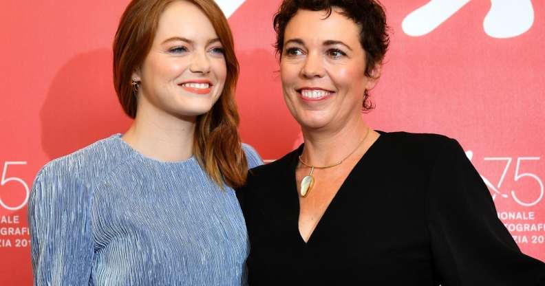Actress Emma Stone (L) and actress Olivia Colman attend a photocall for the film "The Favourite" presented in competition on August 30, 2018 during the 75th Venice Film Festival at Venice Lido. (Photo by Vincenzo PINTO / AFP) (Photo credit should read VINCENZO PINTO/AFP/Getty Images)