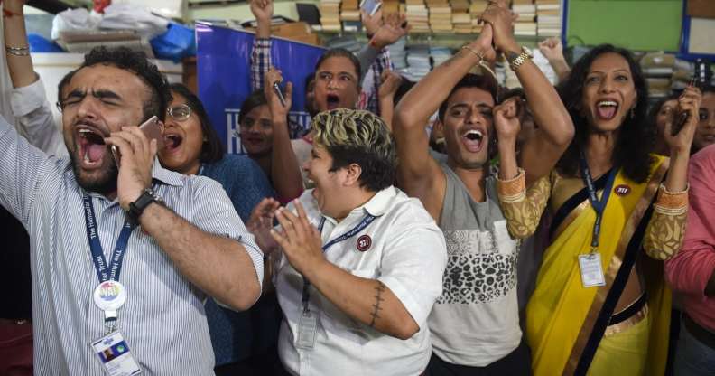 Indian members and supporters of the lesbian, gay, bisexual, transgender (LGBT) community celebrate the Supreme Court decision to strike down a colonial-era ban on gay sex, in Mumbai on September 6, 2018. - India's Supreme Court on September 6 struck down the ban that has been at the centre of years of legal battles. "The law had become a weapon for harassment for the LGBT community," Chief Justice Dipak Misra said as he announced the landmark verdict. (Photo by INDRANIL MUKHERJEE / AFP) (Photo credit should read INDRANIL MUKHERJEE/AFP/Getty Images)