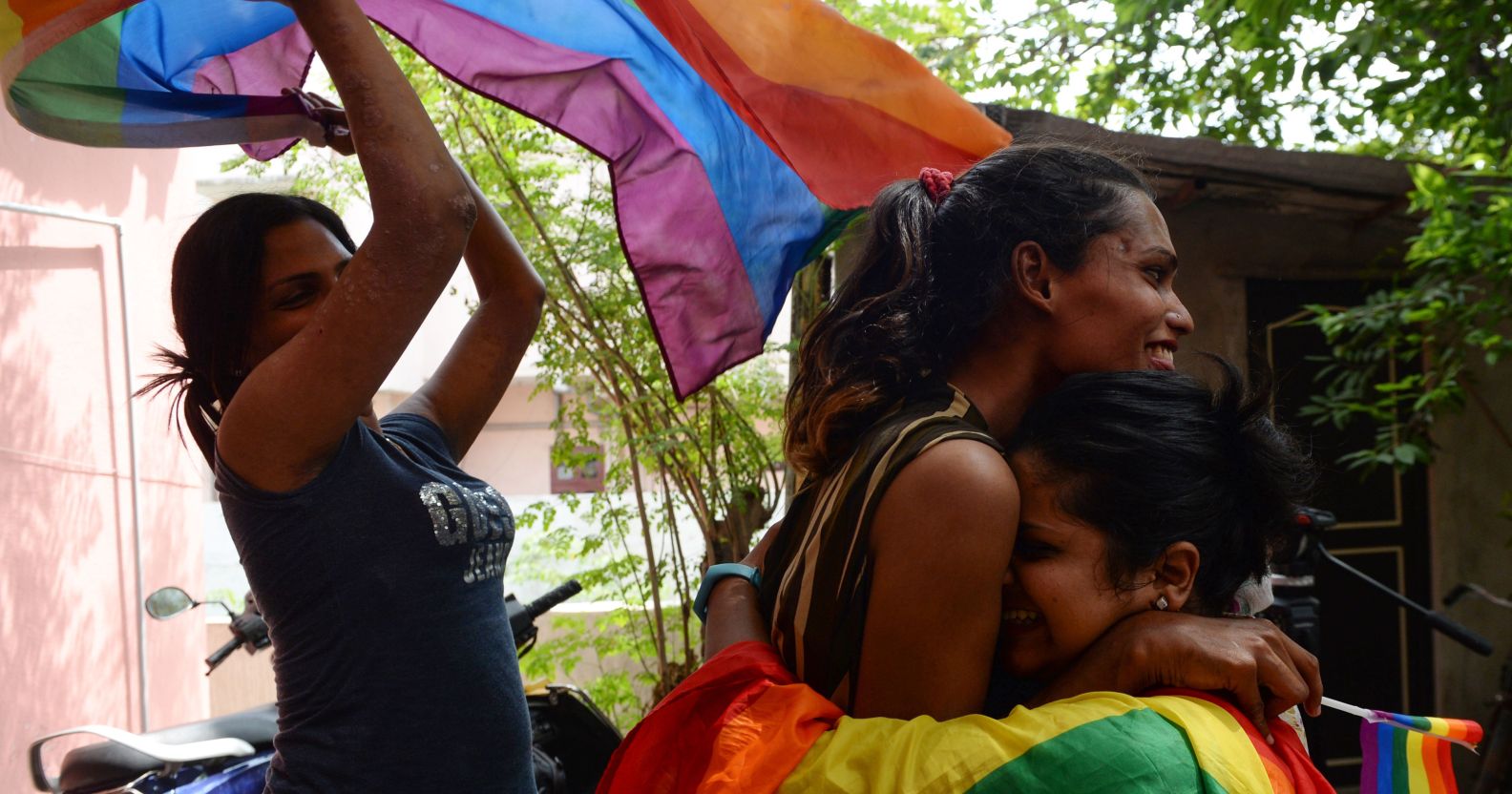 Indian members and supporters of the lesbian, gay, bisexual, transgender (LGBT) community celebrate the Supreme Court decision to strike down a colonial-era ban on gay sex, in Chennai on September 6, 2018. - India's Supreme Court on September 6 struck down the ban that has been at the centre of years of legal battles. "The law had become a weapon for harassment for the LGBT community," Chief Justice Dipak Misra said as he announced the landmark verdict. (Photo by ARUN SANKAR / AFP) (Photo credit should read ARUN SANKAR/AFP/Getty Images)