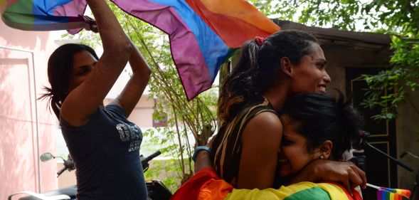 Indian members and supporters of the lesbian, gay, bisexual, transgender (LGBT) community celebrate the Supreme Court decision to strike down a colonial-era ban on gay sex, in Chennai on September 6, 2018. - India's Supreme Court on September 6 struck down the ban that has been at the centre of years of legal battles. "The law had become a weapon for harassment for the LGBT community," Chief Justice Dipak Misra said as he announced the landmark verdict. (Photo by ARUN SANKAR / AFP) (Photo credit should read ARUN SANKAR/AFP/Getty Images)