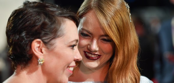Olivia Colman and Emma Stone attend the UK Premiere of "The Favourite," the movie in which the two act in a sex scene.