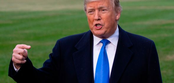 US President Donald Trump talks to reporters on the South Lawn of the White House prior to boarding Marine One on October 26, 2018 in Washington, DC. - Trump is traveling to North Carolina for a "Make America Great Again" rally. (Photo by Alex Edelman / AFP) (Photo credit should read ALEX EDELMAN/AFP/Getty Images)