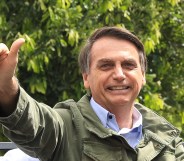 RIO DE JAaNEIRO, BRAZIL - OCTOBER 28: Jair Bolsonaro, far-right lawmaker and presidential candidate of the Social Liberal Party (PSL), gestures after casting his vote during general elections on October 28, 2018 in Rio de Janeiro, Brazil. (Photo by Buda Mendes/Getty Images)