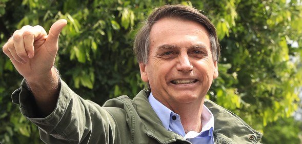 RIO DE JAaNEIRO, BRAZIL - OCTOBER 28: Jair Bolsonaro, far-right lawmaker and presidential candidate of the Social Liberal Party (PSL), gestures after casting his vote during general elections on October 28, 2018 in Rio de Janeiro, Brazil. (Photo by Buda Mendes/Getty Images)
