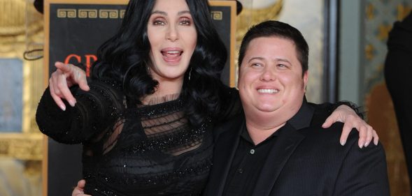 Cher poses with her son Chaz Bono in 2010