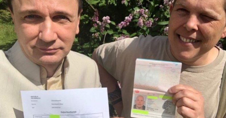 Intersex activist Alex Jurgen (R) receives Austria's first-ever documents recognising a third gender option.