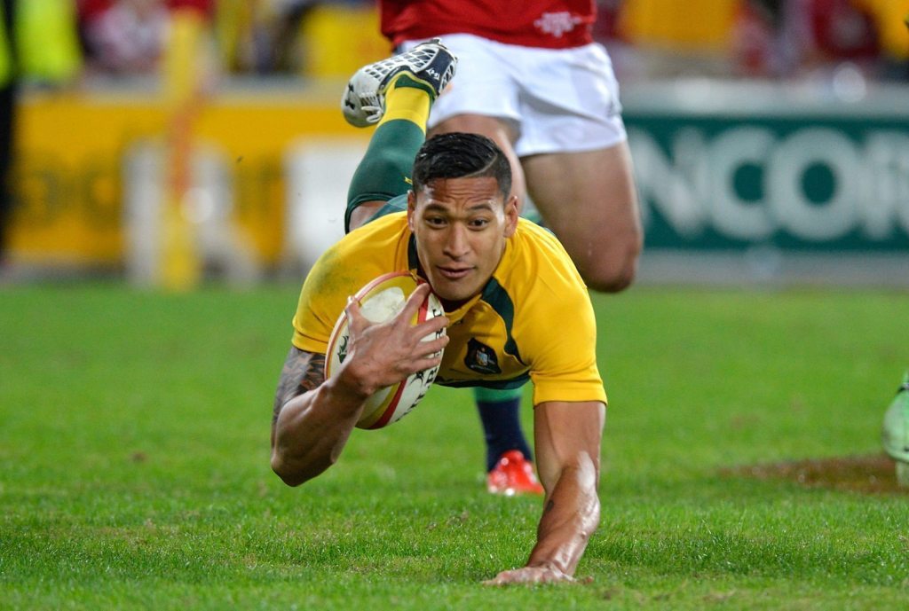BRISBANE, AUSTRALIA - JUNE 22: Israel Folau of the Wallabies scores a try during the First Test match between the Australian Wallabies and the British & Irish Lions at Suncorp Stadium on June 22, 2013 in Brisbane, Australia. (Photo by Bradley Kanaris/Getty Images)