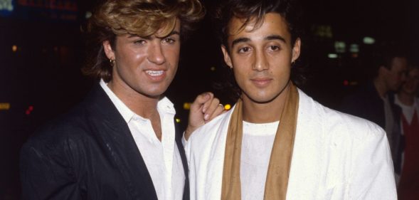 1984: British singer songwriter George Michael, lead singer of the pop group Wham!, with the group's guitarist Andrew Ridgeley at the film premiere of the hit 'Dune'. (Photo by Hulton Archive/Getty Images)