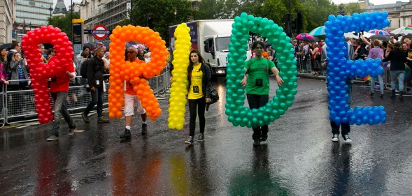People take part in the Pride in London march in 2014, which celebrates those identifying as part of the LGBT acronym and their allies.