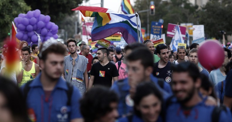 Israelis take part in the 12th anniversary Gay Pride parade in Jerusalem on September 18, 2014. (THOMAS COEX/AFP/Getty Images)
