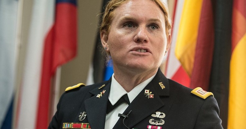 Transgender US Army Reseve Captain Sage Fox speaks during a conference entitled "Perspectives on Transgender Military Service from Around the Globe" organized by the American Civil Liberties Union (ACLU) and the Palm Center in Washington on October 20, 2014. Transgender military personnel from 18 countries who allow them to serve openly, gathered to talk about their experiences and discuss whether the US military could join them. After Separtating from the military as a man, Fox legally changed her gender, and was invited to join the reserves as a woman. AFP PHOTO/Nicholas KAMM (Photo credit should read NICHOLAS KAMM/AFP/Getty Images)