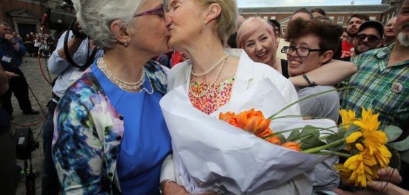 Irish Senator Katherine Zappone kisses her partner Ann Louise Gilligan following the same-sex marriage referendum in Ireland