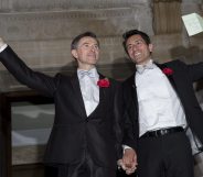 LONDON, ENGLAND - MARCH 29: Gay couple Peter McGraith and David Cabreza leave Islington Town Hall after being married shortly after midnight in one of the UK's first same-sex weddings on March 29, 2014 in London, England. Same sex couples have been able to enter into 'civil partnerships' since 2005, however following a change in the law in July 2013 gay couples are now eligible to marry in England and Wales. A number of gay couples have arranged for their wedding ceremonies to take place shortly after midnight on March 29, 2014 to become some of the first to take advantage of the new law. Parliament's decision to grant same sex couples an equal right to marriage has been met with opposition from religious groups. Gay marriage is currently being debated in Scotland, however the Northern Ireland administration has no plans to make it law. (Photo by Rob Stothard/Getty Images)