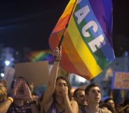 JERUSALEM, ISRAEL - AUGUST 01: Israelis and members of the gay community attend an anti-homophobia rally on August 1, 2015 in Jerusalem, Israel. Thousands of people took part in rallies across Israel to protest Thursday's stabbing attack at Jerusalem's Gay Pride parade and the West Bank arson attack in which an 18-month-old Palestinian infant was killed. (Photo by Lior Mizrahi/Getty Images)
