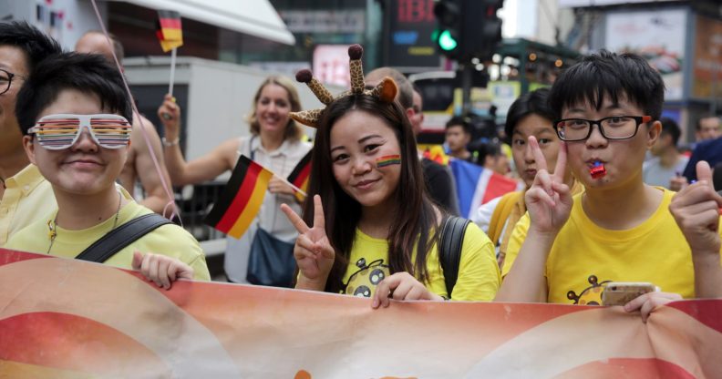 People take part in the Lesbian, Gay, Bi-sexual and Transgender (LGBT) parade in Hong Kong on November 6, 2015. Hong Kong's streets were coloured by rainbow flags as protesters marched in the city's annual gay pride parade to call for equality and same-sex marriage. AFP PHOTO / ISAAC LAWRENCE (Photo credit should read Isaac Lawrence/AFP/Getty Images)