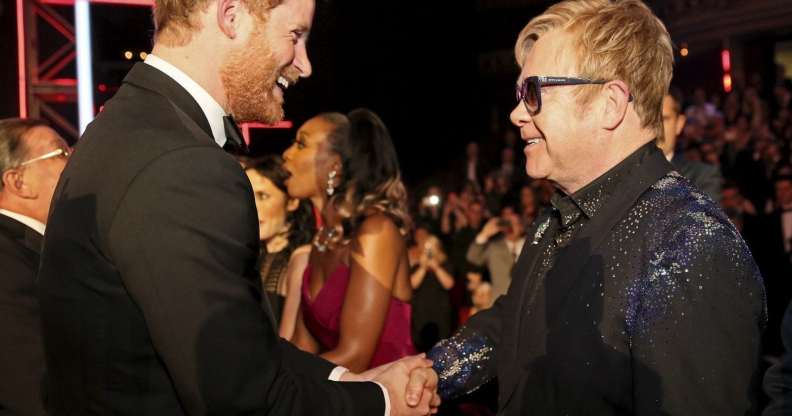 LONDON, ENGLAND - NOVEMBER 13: Britain's Prince Harry greets Elton John after the Royal Variety Performance at the Albert Hall on November 13, 2015 in London, England. (Photo by Paul Hackett - WPA Pool/Getty Images)